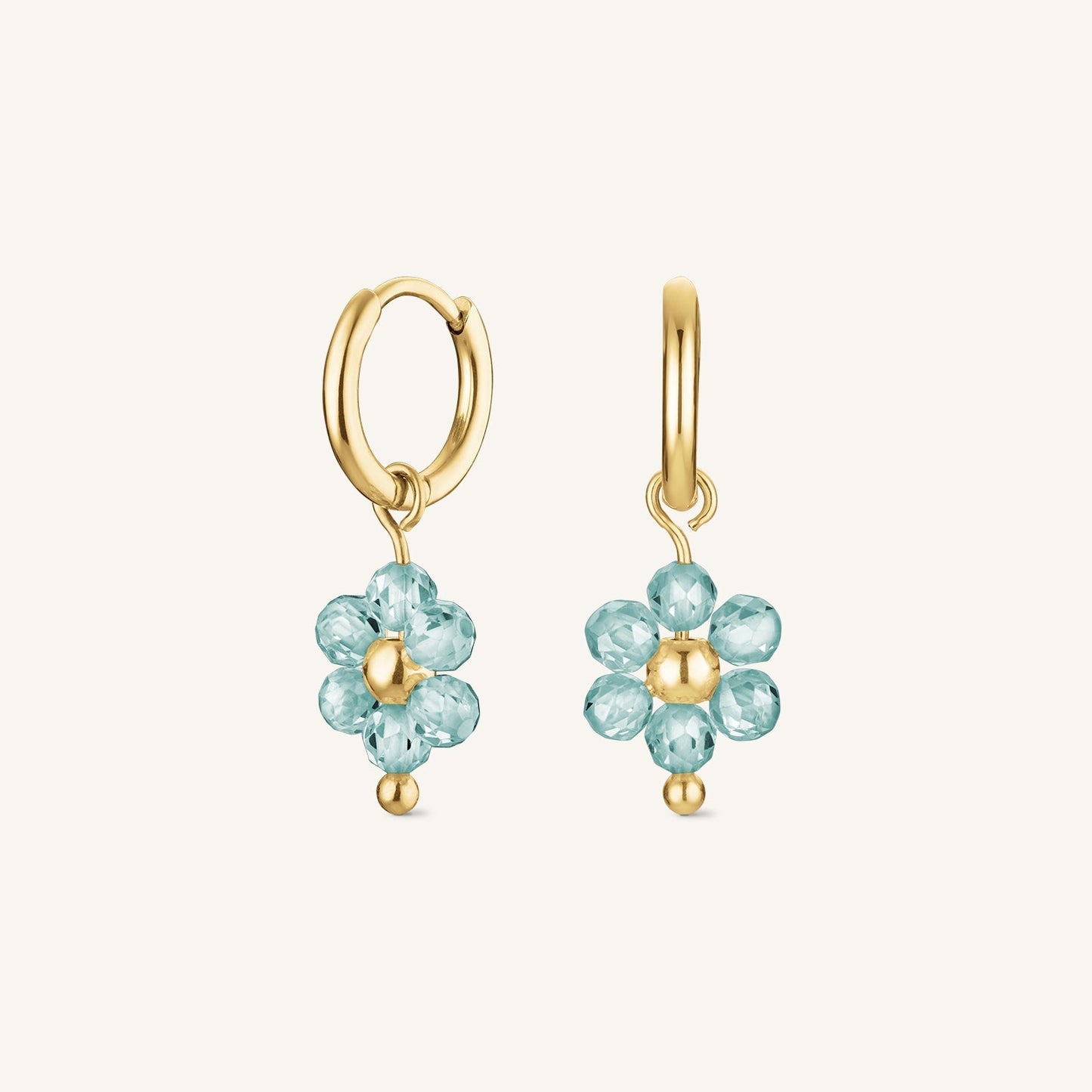 Boucle d'oreille fleur bleue